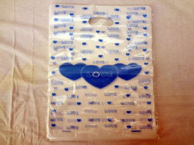 Пакет з врізною ручкою "Газета", 30×40 см (100 шт.)